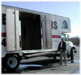 Heavy-duty 3,000-pound capacity loading ramp on a moving truck